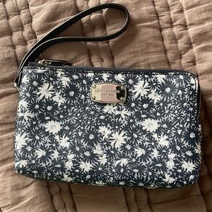 Micheal Kors navy blue/white floral wristlet. Perfect for spring and summer!